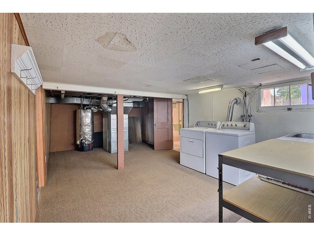 Property Photo 30 Downstairs Laundry Room and Storage