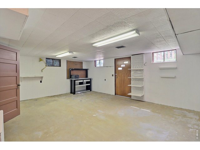 Property Photo 32 Downstairs Craft Room or Workshop Area