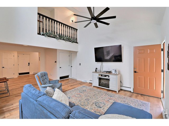 Property Photo 8 Living Room with Balcony View