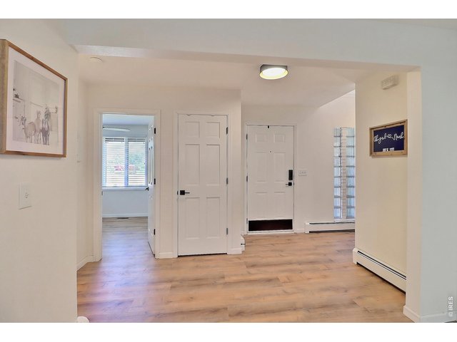Property Photo 13 Entryway Leads You to Main Floor Bedroom and Stairway