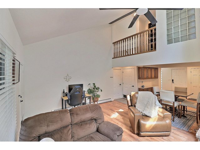 Property Photo 32 Vaulted Ceilings with Balcony Views