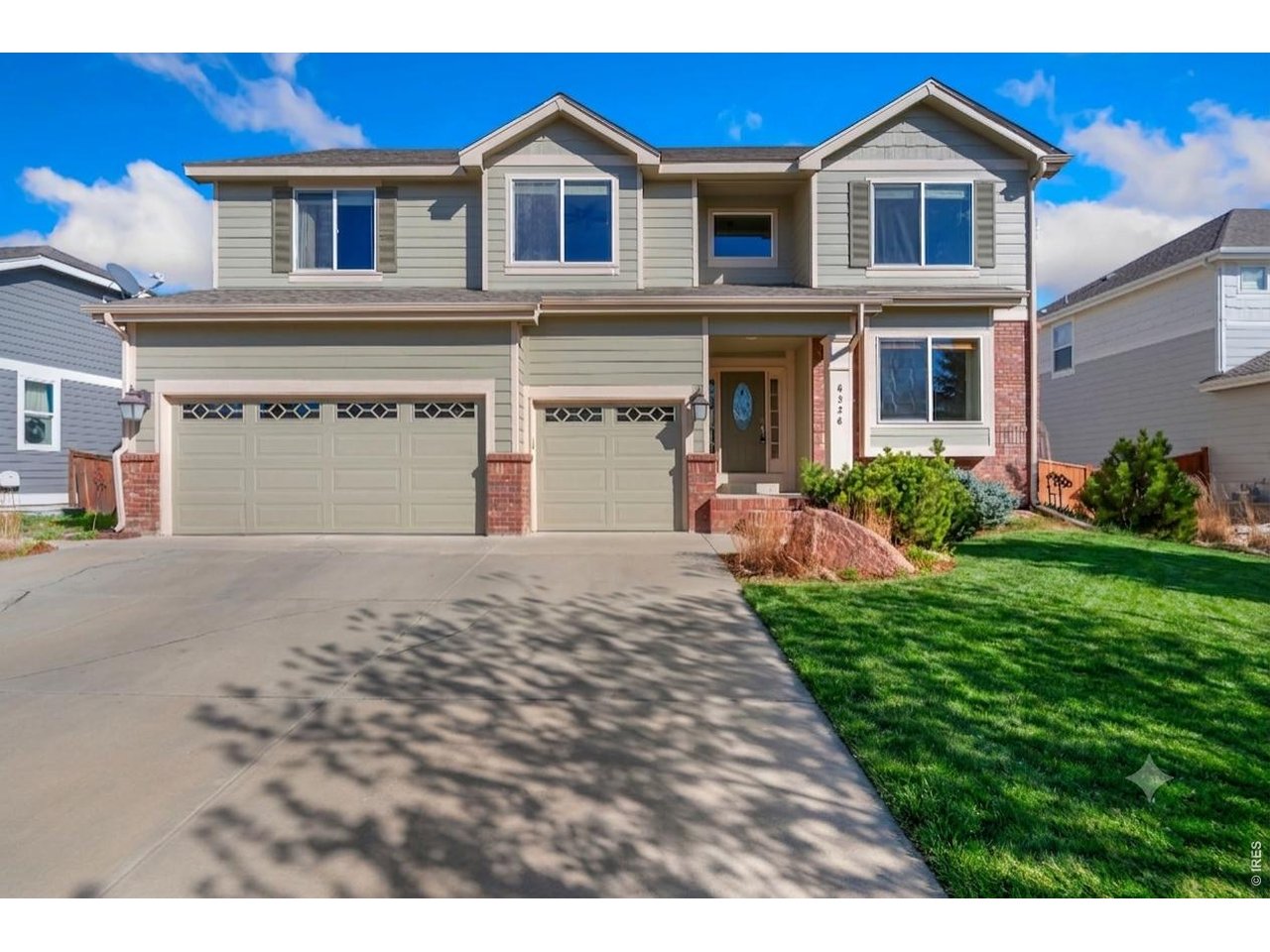 Property Photo 49 Gorgeous 2 story home with western exposure. *Grass virtually enhance to reflect current condition.