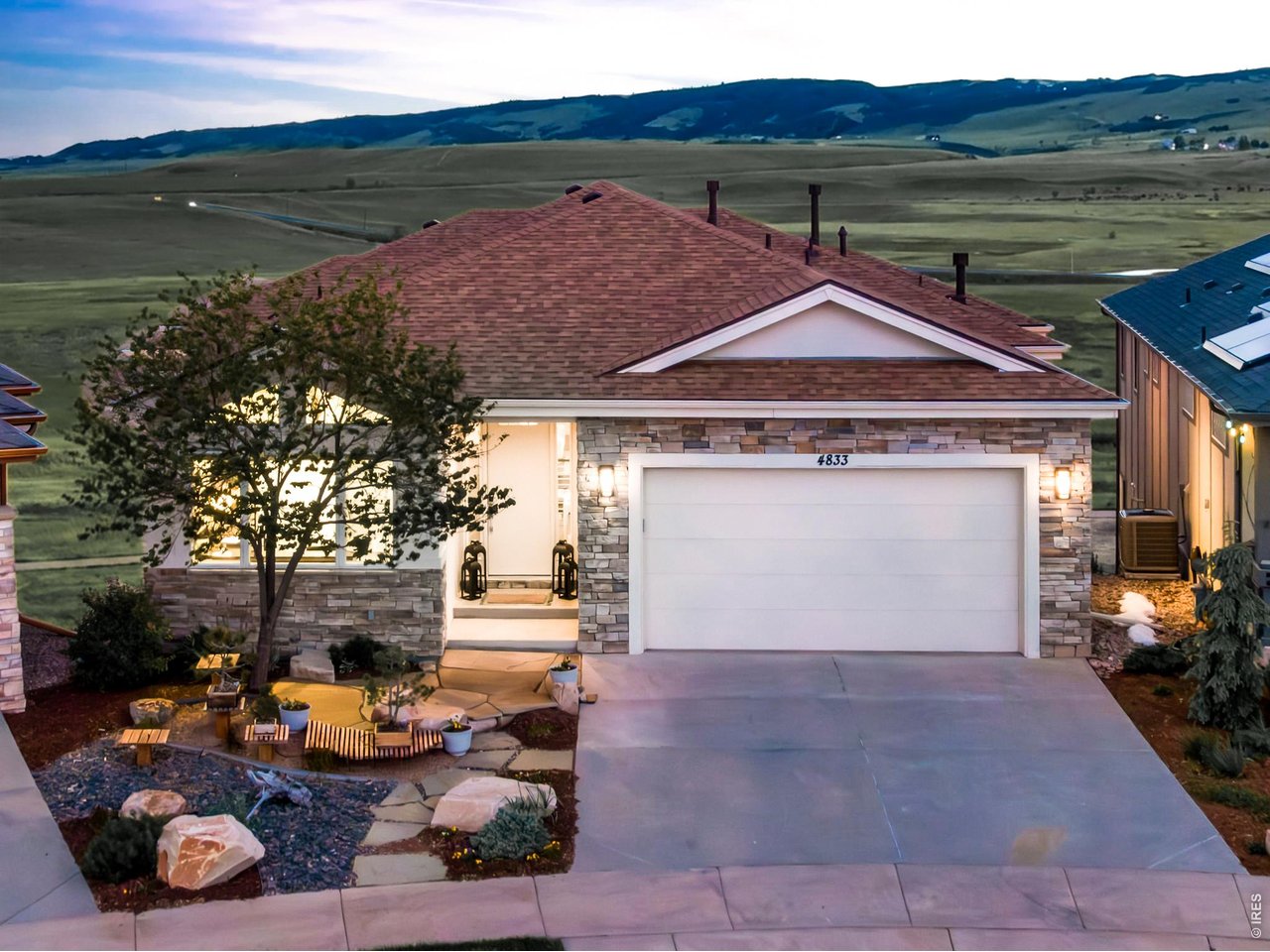 Property Photo 1 Exceptionally appointment Custom Ranch, Backing to approximately 240 acres of Open Space, Heavenly Mountain/Foothills views for as far as you can see! Curated Modern Feel, New Class IV roof installed 04/2026, low maintenance, stuccco and stone exterior.