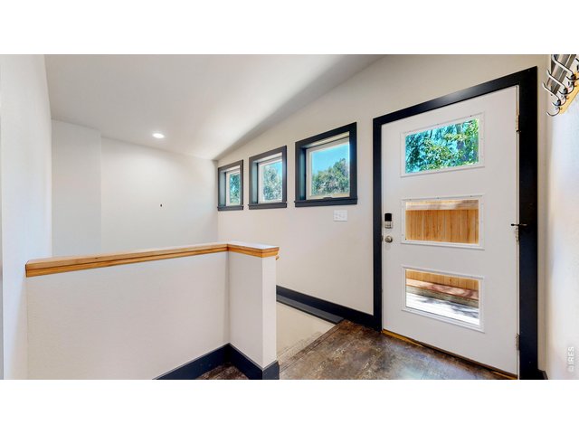 Property Photo 30 Separate side entry and staircase to basement