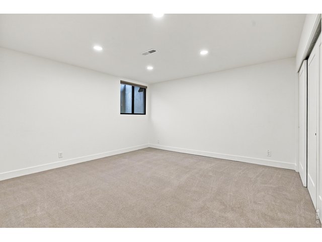 Property Photo 45 Basement bedroom 2 (has a large walk-in closet)