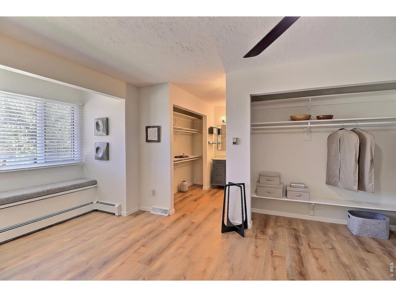 Property Photo 20 Upstairs Primary Bedroom/Closets Virtually Staged