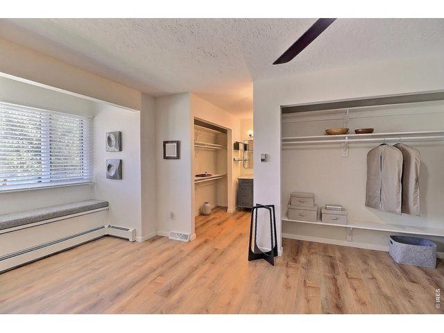 Property Photo 20 Upstairs Primary Bedroom/Closets Virtually Staged