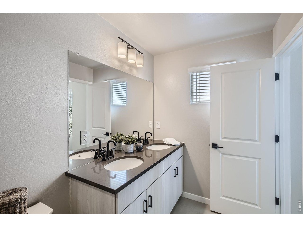 Property Photo 11 Primary Bathroom with double sinks