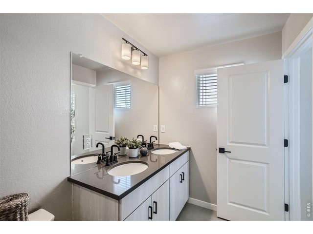 Property Photo 11 Primary Bathroom with double sinks