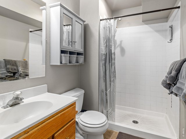 Property Photo 13 3/4 bath lower level completes the private primary suite