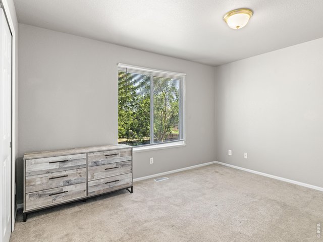 Property Photo 18 Bedroom 3 of 3, upper level