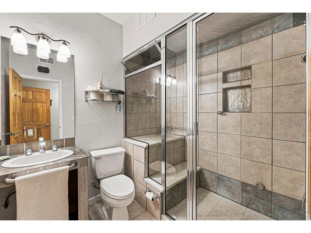 Property Photo 24 Basement Bathroom with Steam