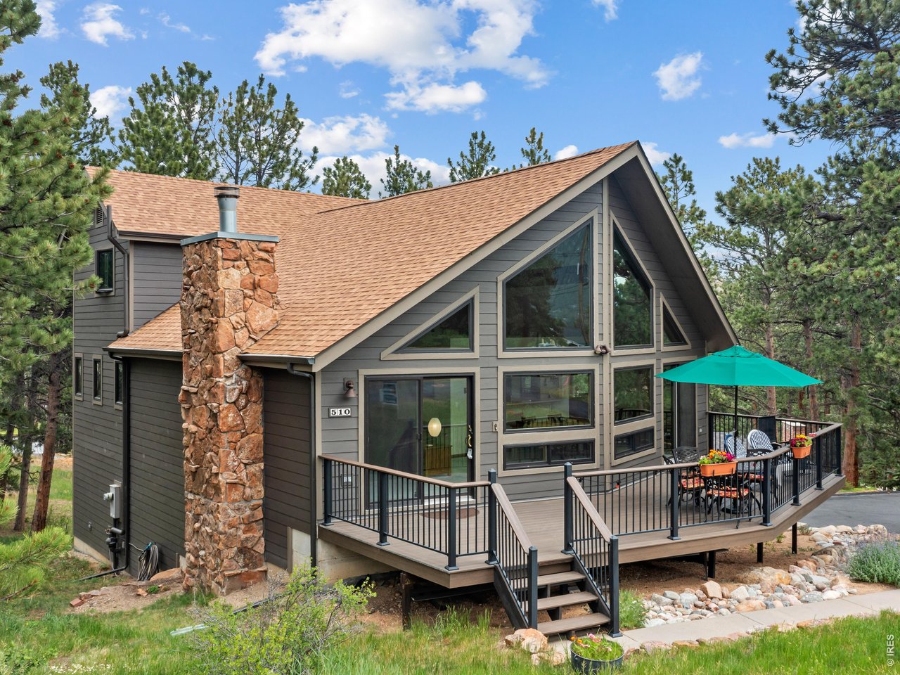 Property Photo 5 Nestled among the Ponderosa Pines on a gently sloping lot on a quiet street in the Big Horn neighborhood.
