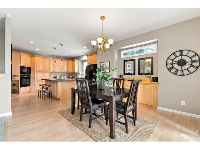 Property Photo 11 Dining room opens to kitchen.