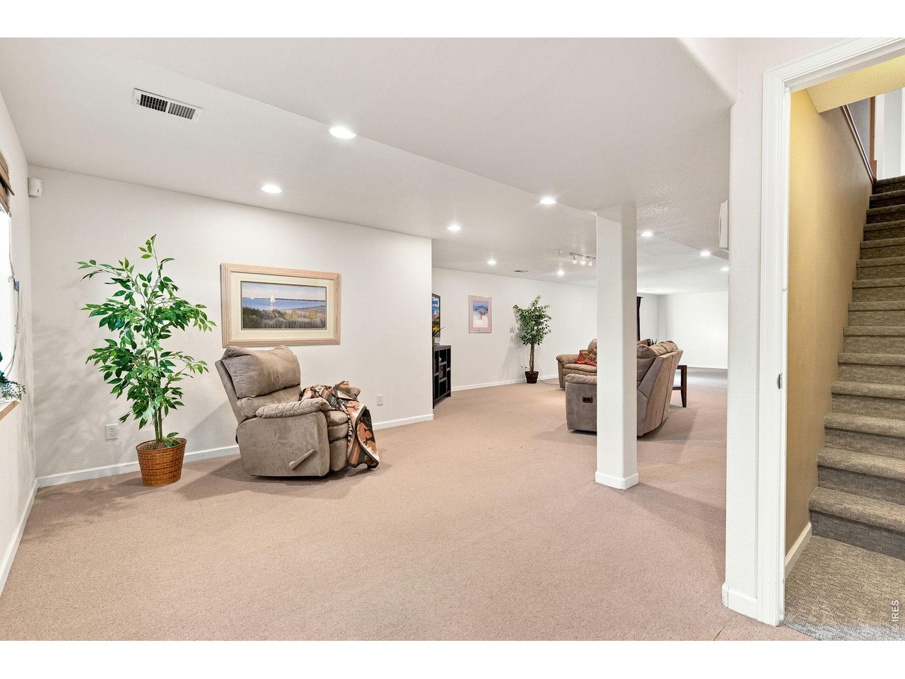 Property Photo 25 Massive finished family room in basement (36 x 14).
