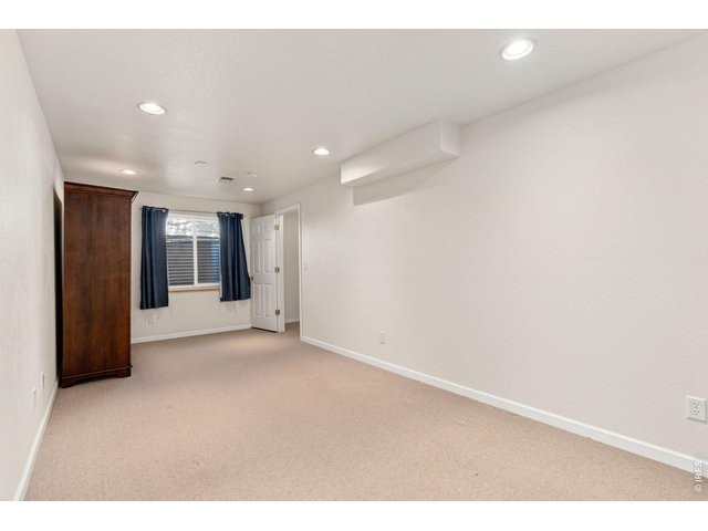 Property Photo 31 Non-conforming third bedroom in basement (21 x 9).