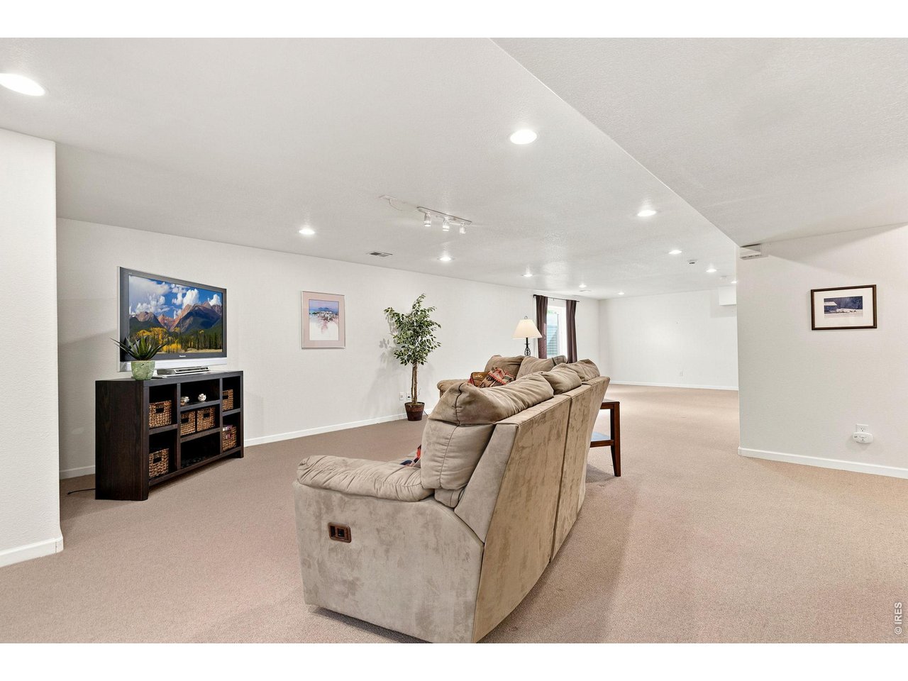 Property Photo 26 Finished basement with plenty of space for movies and game-room.