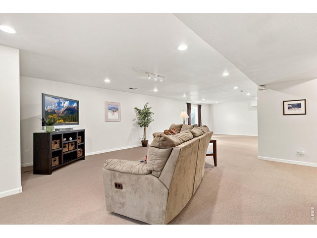 Property Photo 26 Finished basement with plenty of space for movies and game-room.