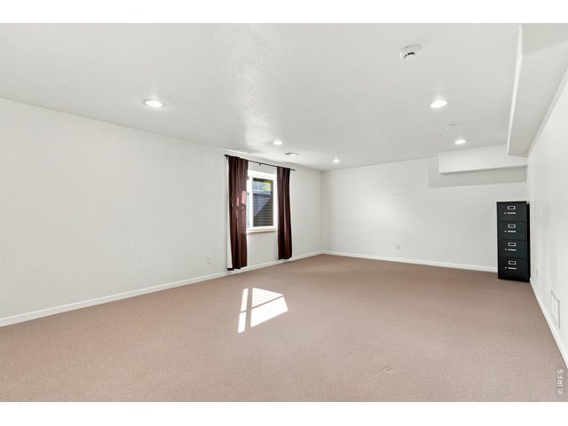 Property Photo 29 Family room in basement.