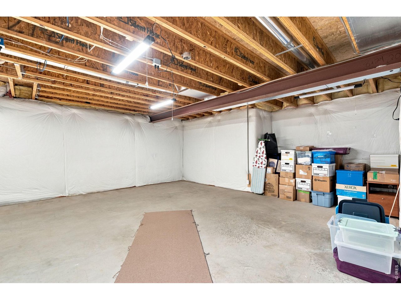 Property Photo 33 Clean storage room and utility room in basement.