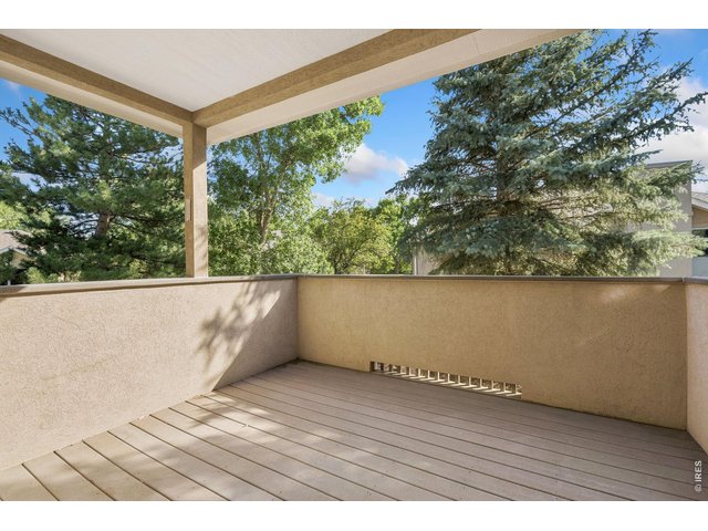 Property Photo 34 Covered back deck off dining room.