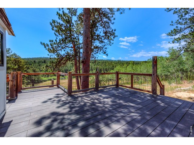 Property Photo 9 Big deck to enjoy the outdoors