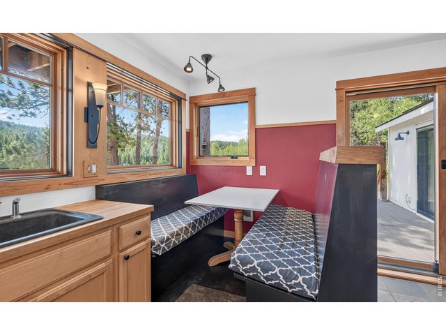Property Photo 16 Built in eating nook with storage under the bench