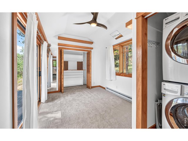 Property Photo 19 Or office with built in desk in one closet, laundry in the other