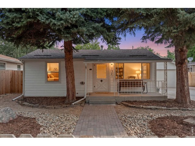 Property Photo 1 Extensively updated east Loveland gem with R3e zoning, a two-car garage, and a private backyard!