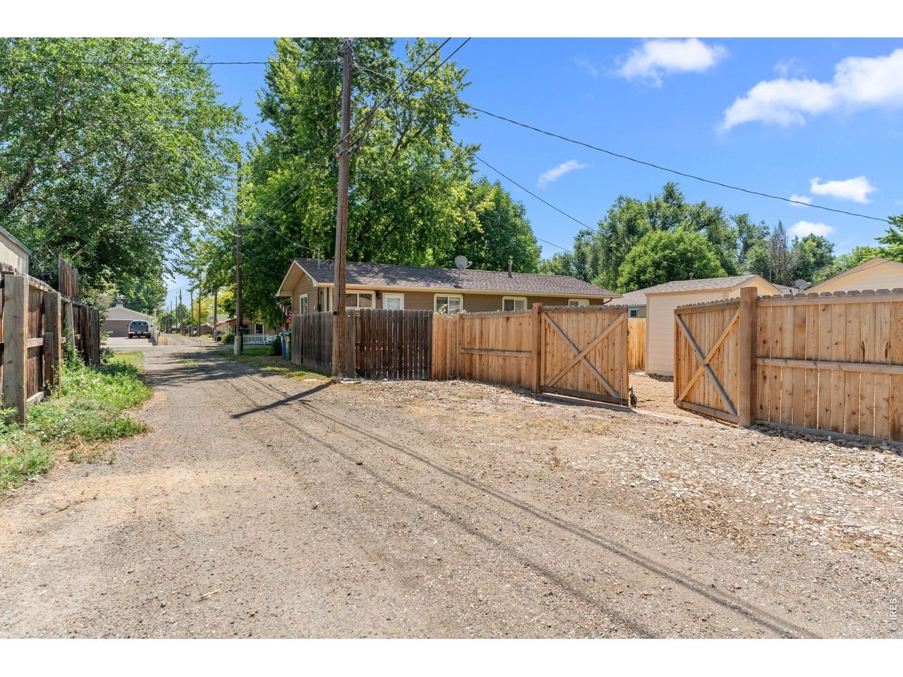 Property Photo 19 Alley access with an oversized gate - park your RV, work vehicle, trailer, or small boat