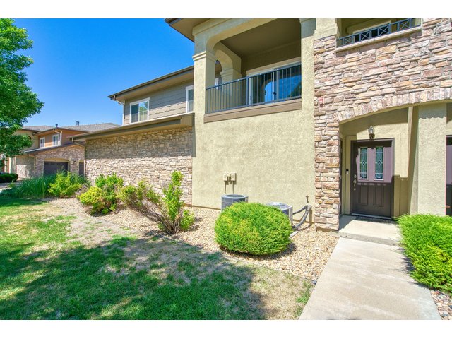 Property Photo 2 Upper level one story end unit condo is very well-maintained and move-in ready!