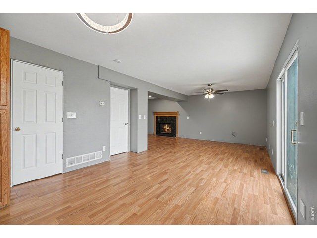 Property Photo 6 Living Room/ Dining Area