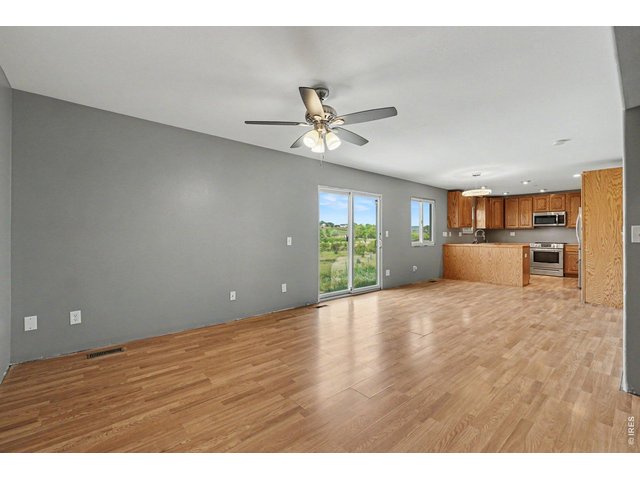 Property Photo 5 Living Room/ Dining Area/ Kitchen