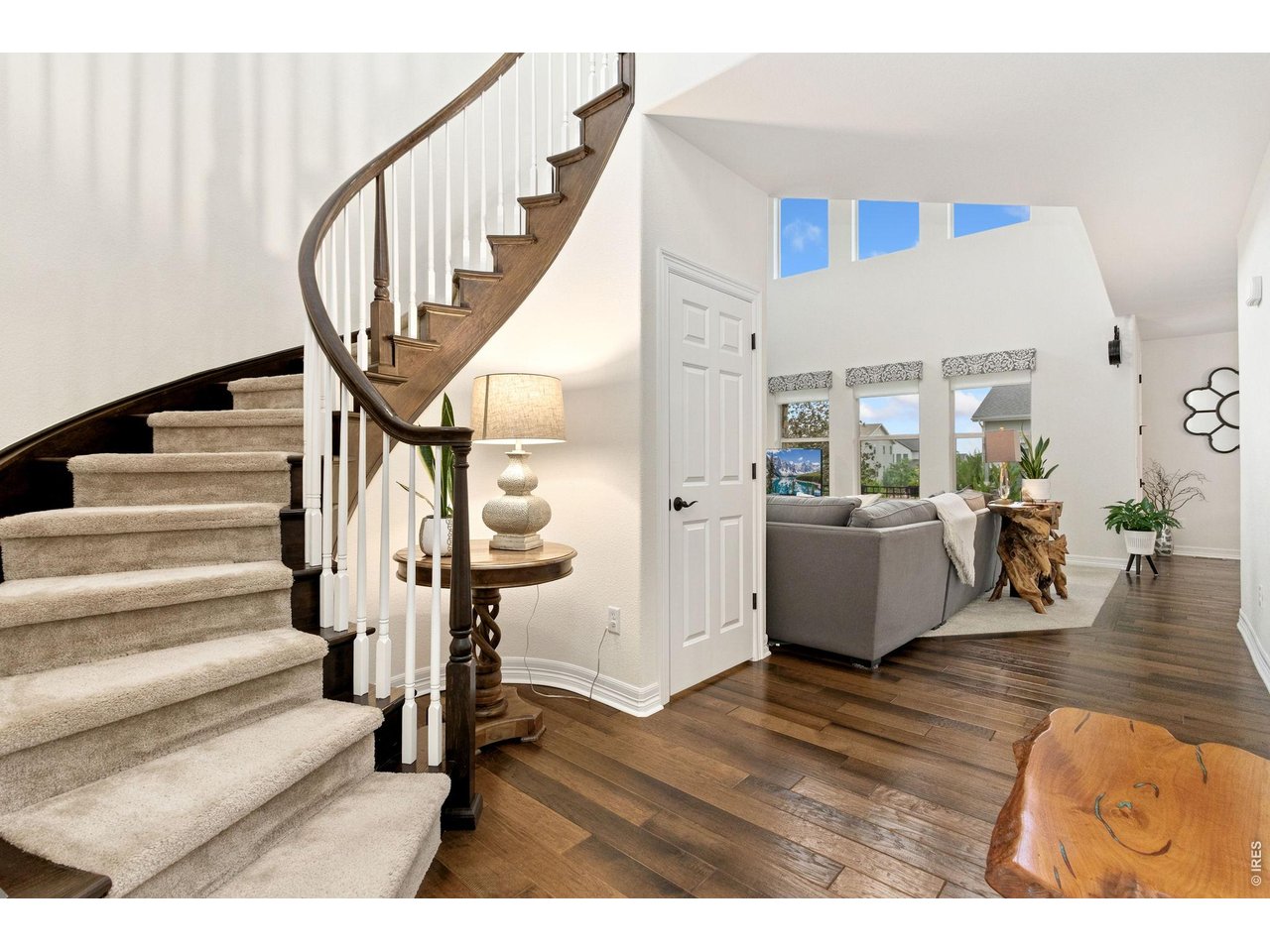 Property Photo 6 Gorgeous spiral staircase, greets you as you enter the home.
