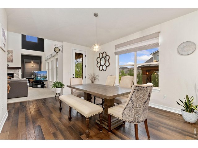 Property Photo 12 Great room with a natural flow into the eat in kitchen.