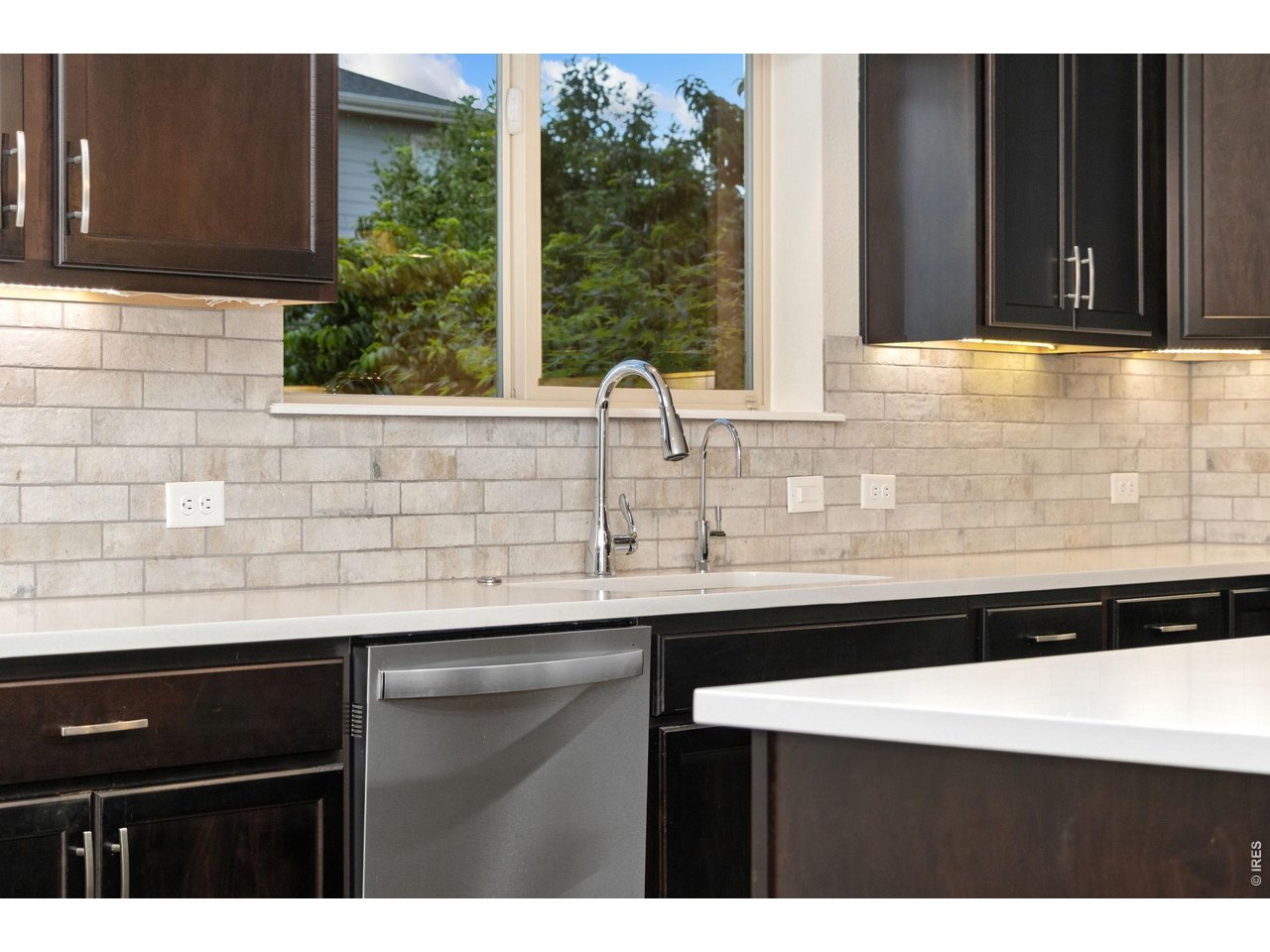 Property Photo 17 Kitchen faucet with deep sink and reverse osmosis water disbursement system.