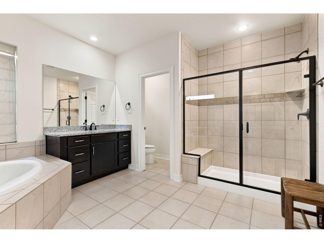 Property Photo 28 Primary ensuite bathroom walk in shower.