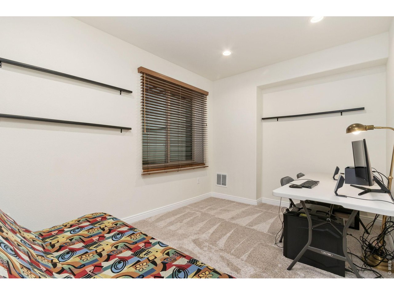 Property Photo 39 Basement bedroom with egress window.