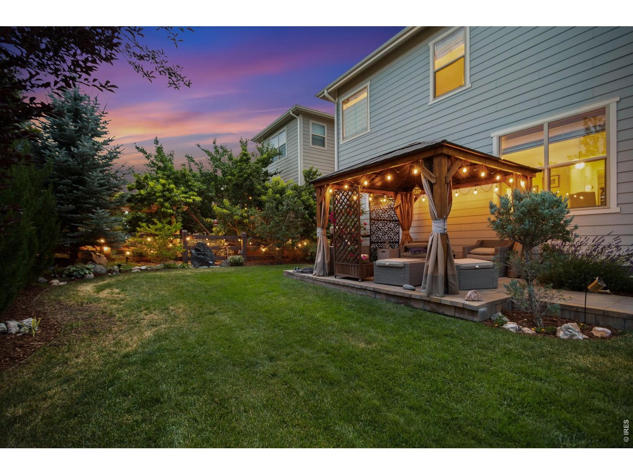 Property Photo 42 Backyard offers a relaxed evening setting.