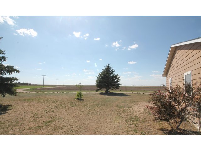 Property Photo 5 South side of home looking towards the west