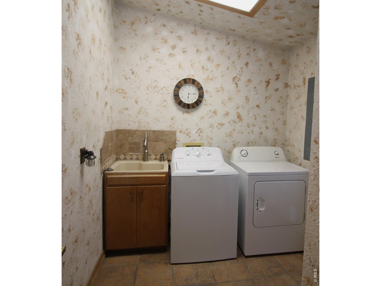 Property Photo 13 Laundry and 1/2 bath off kitchen