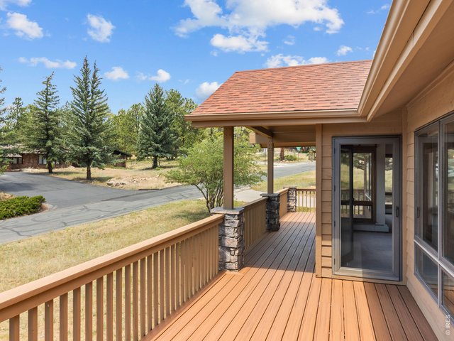 Property Photo 5 Expansive front deck