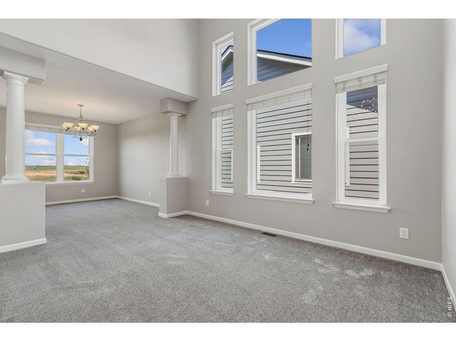 Property Photo 6 Formal Living Room with 2 story ceiling!