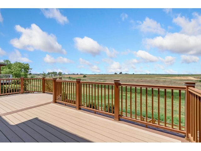 Property Photo 30 Custom deck off back of home!
