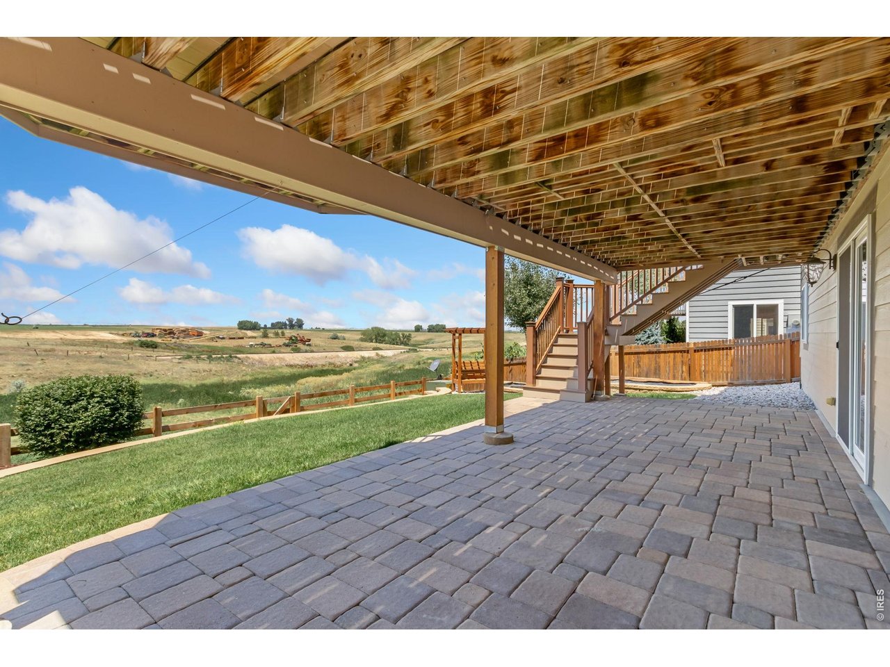 Property Photo 29 Large Patio under deck and outside of basement slider