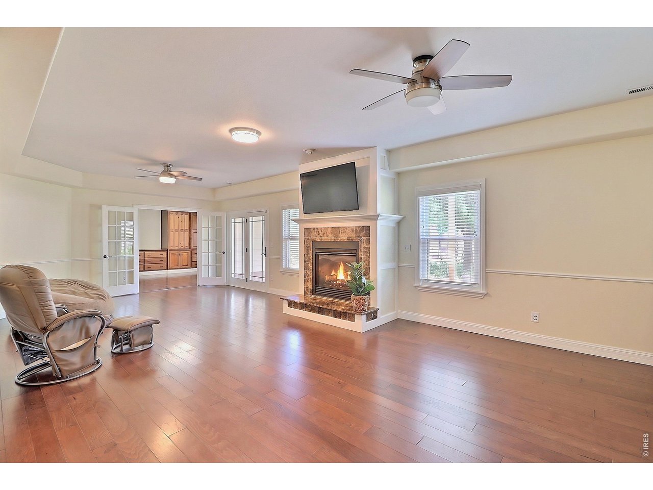 Property Photo 32 Head Downstairs to an Amazing Family Room with Gas Fireplace
