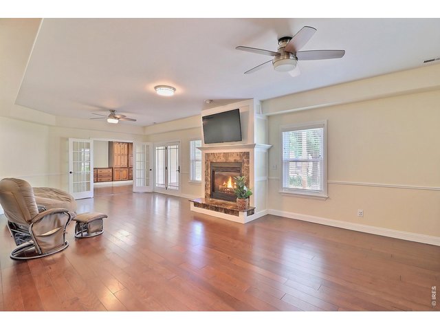 Property Photo 32 Head Downstairs to an Amazing Family Room with Gas Fireplace