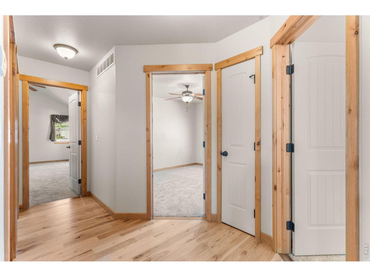 Property Photo 12 All 3 main level bedroom door entrties