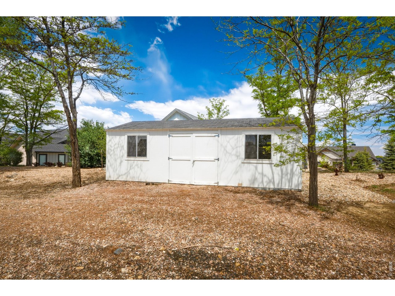 Property Photo 38 Detached outbuilding-ideal for storage, hobbies, or workshop use.