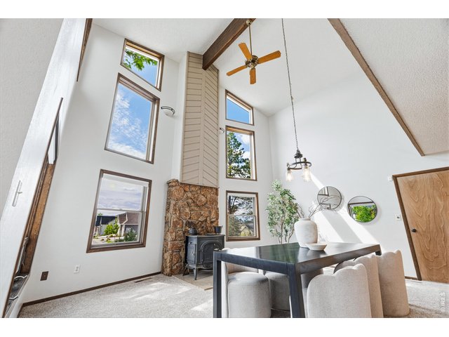 Property Photo 15 Soaring ceilings and a dramatic wall of windows.